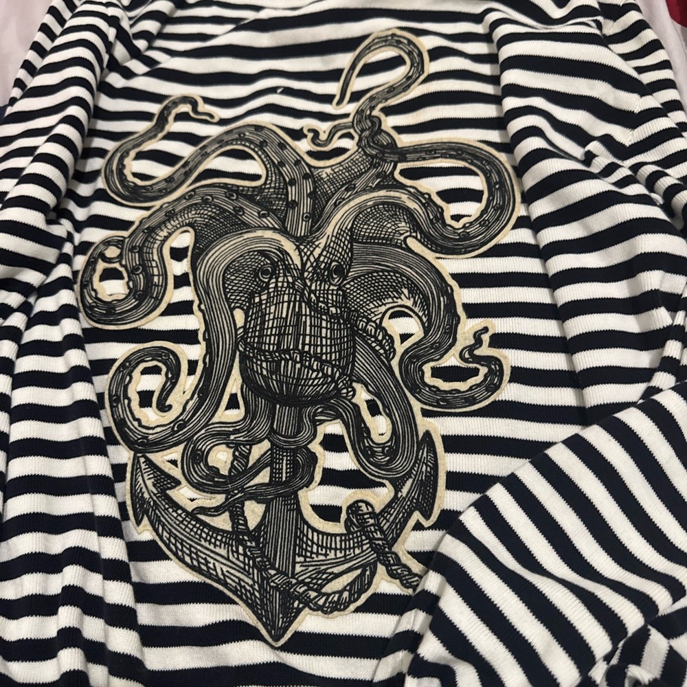 This is a Gucci Striped Octopus Trainer Sweater in white and black.